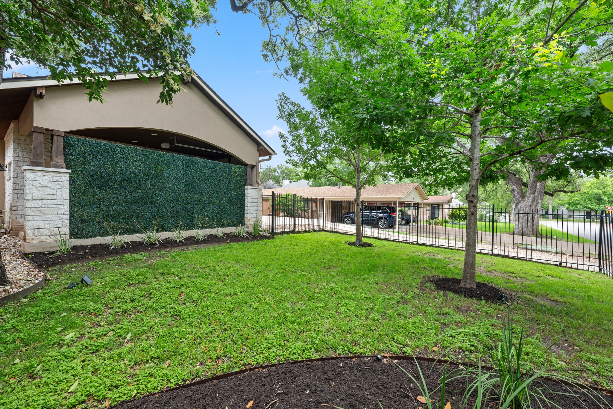 3907 Bailey Lane Austin, TX 78756 - Photo 33 of 40 Generous and fenced front yard allows extra space for pets or kids, in addition to enclosed turf yard in back.