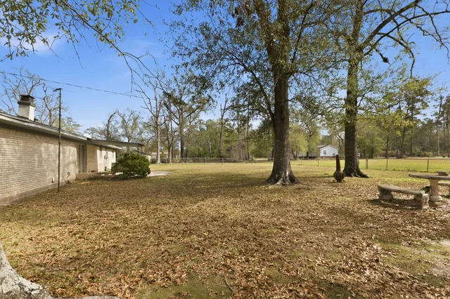 a view of an ocean and a yard