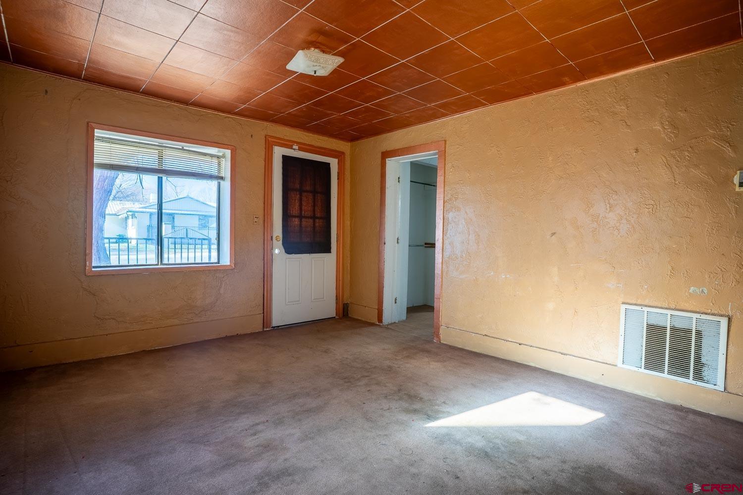 120 Browning Avenue Ignacio, CO 81137 - Photo 10 of 36 an empty room with windows