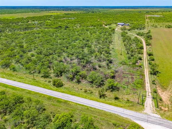 a view of a yard with an outdoor space