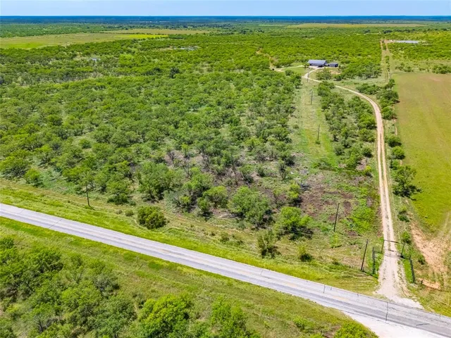 a view of a yard with an outdoor space