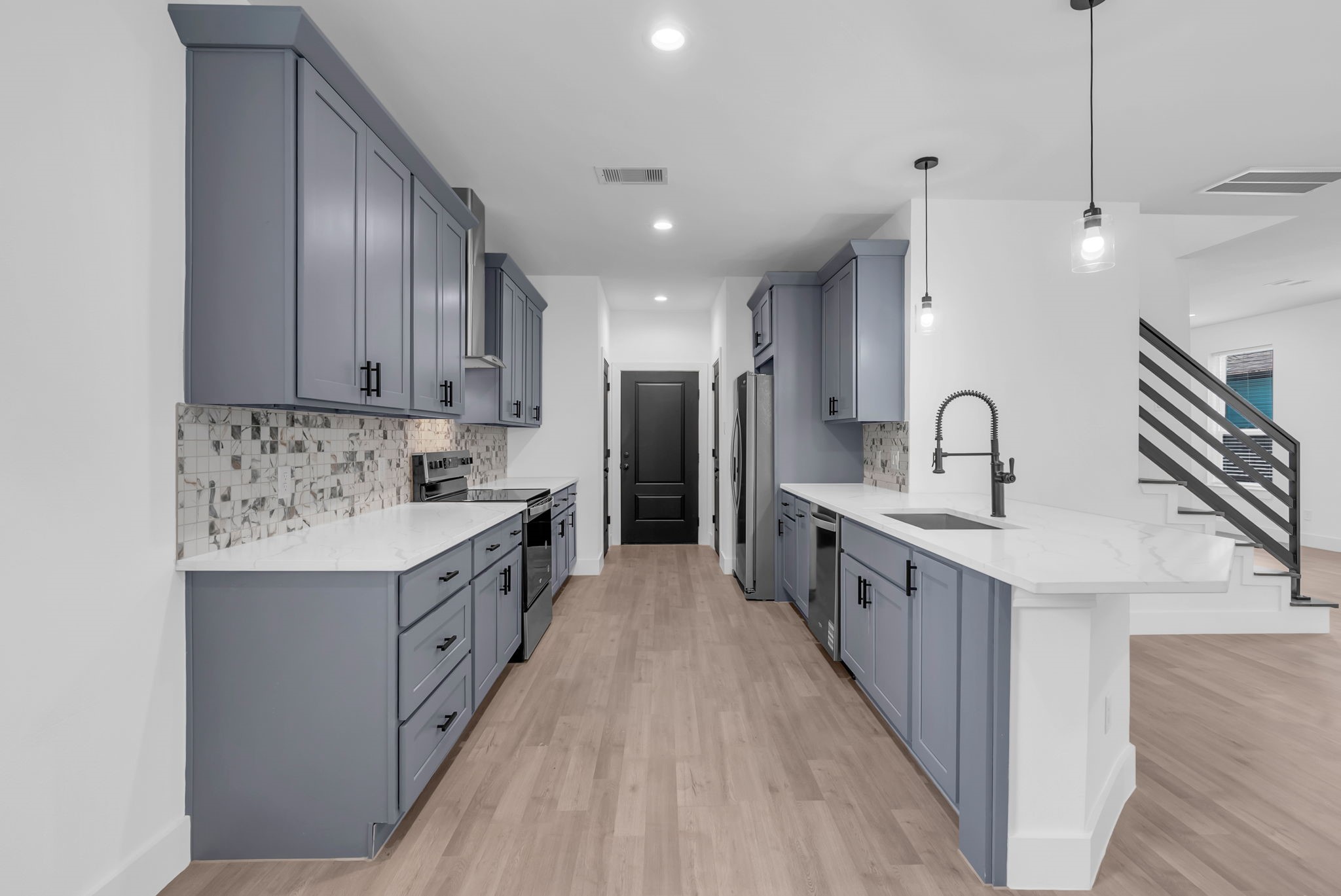 8136 Chateau Street Houston, TX 77028 - Photo 9 of 46 pendant lights, quartz countertops
