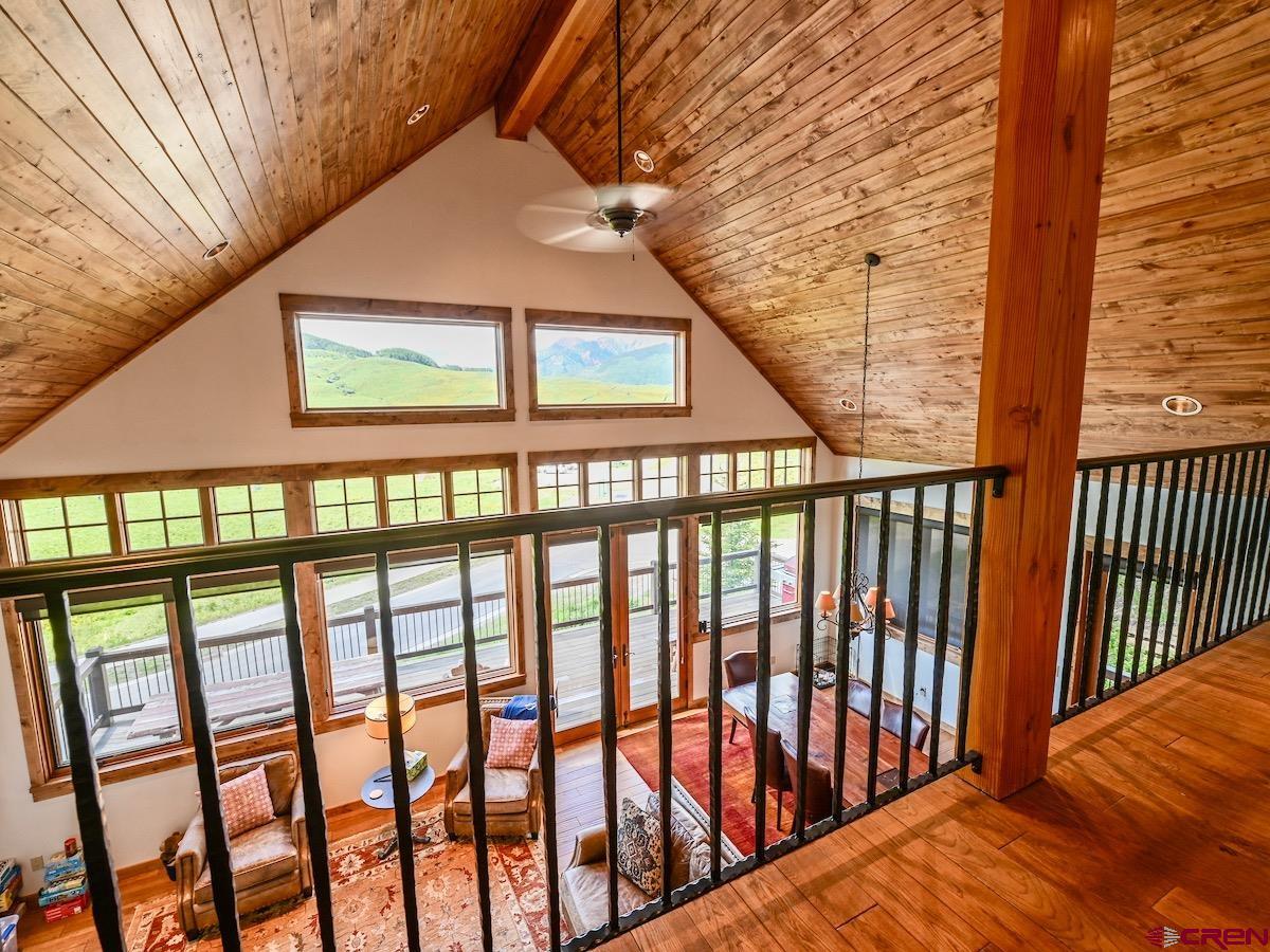 930 Gothic Road Crested Butte, CO 81225 - Photo 12 of 35 a view of staircase with a small yard