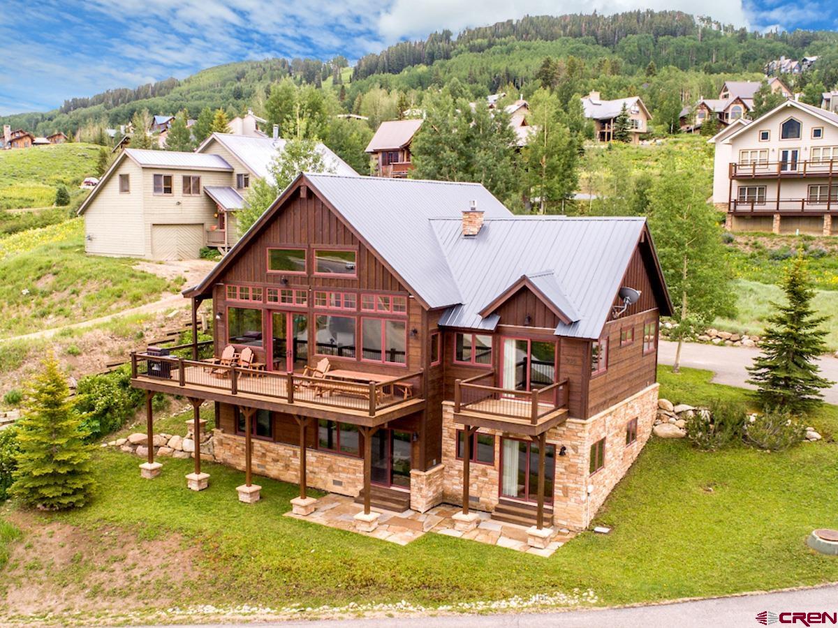 930 Gothic Road Crested Butte, CO 81225 - Photo 2 of 35 an aerial view of residential houses with outdoor space and trees