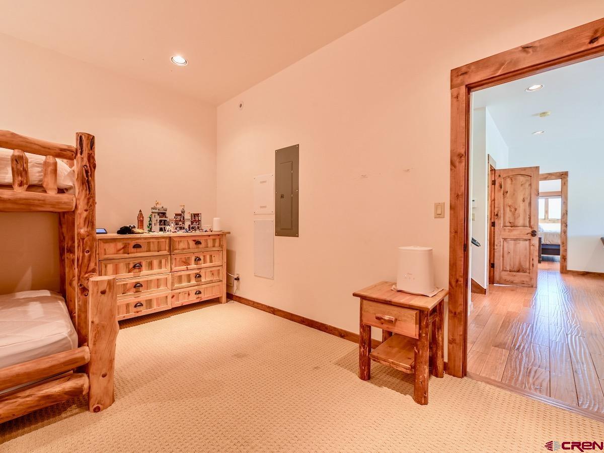 930 Gothic Road Crested Butte, CO 81225 - Photo 28 of 35 a view of a livingroom with furniture and front door