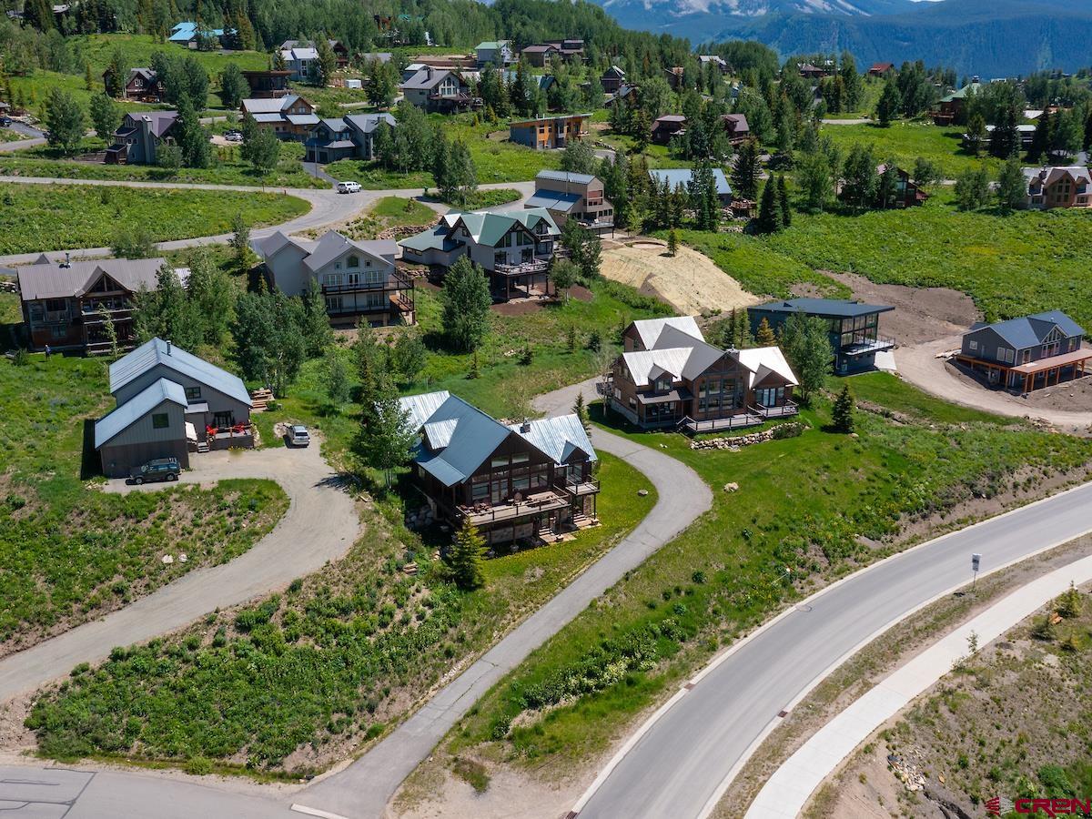 930 Gothic Road Crested Butte, CO 81225 - Photo 34 of 35 an aerial view of a house with garden