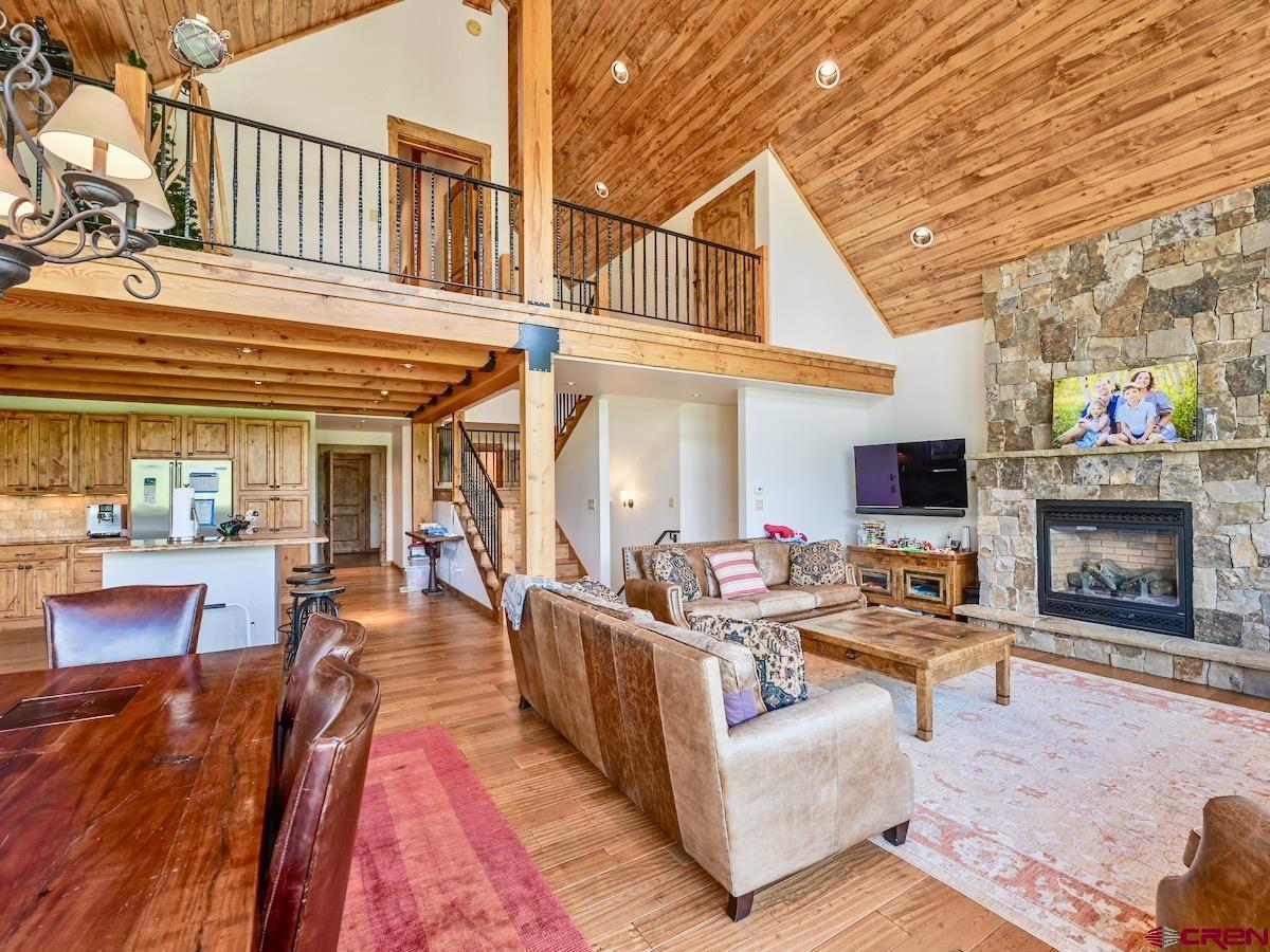 930 Gothic Road Crested Butte, CO 81225 - Photo 7 of 35 a view of a house with swimming pool and sitting area