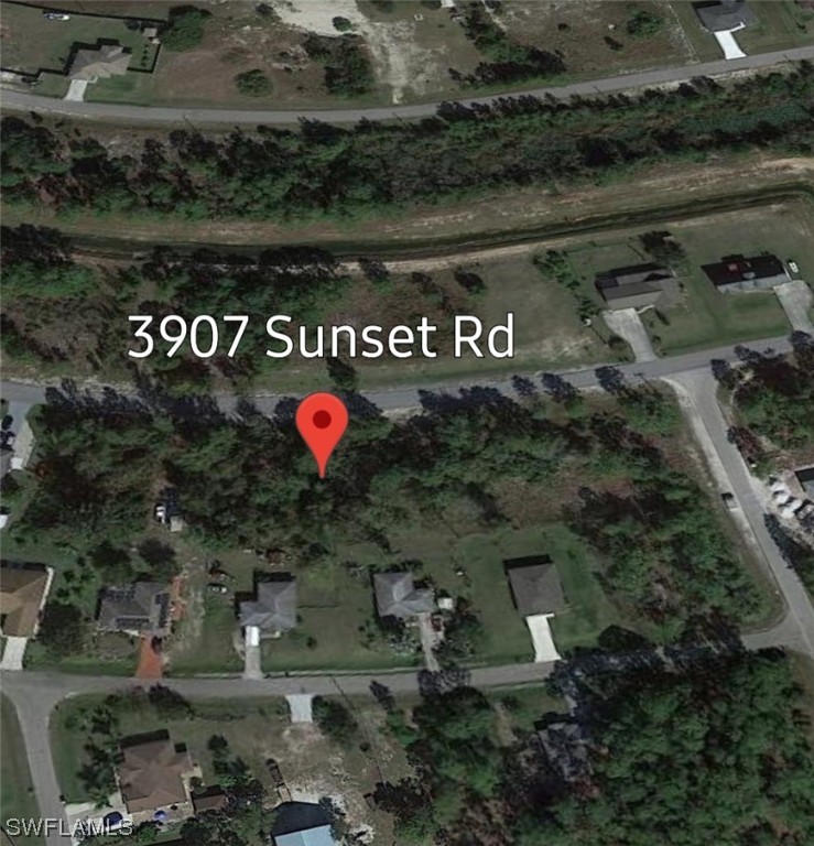 3907 Sunset Road Lehigh Acres, FL 33971 - Photo 2 of 3 a view of street