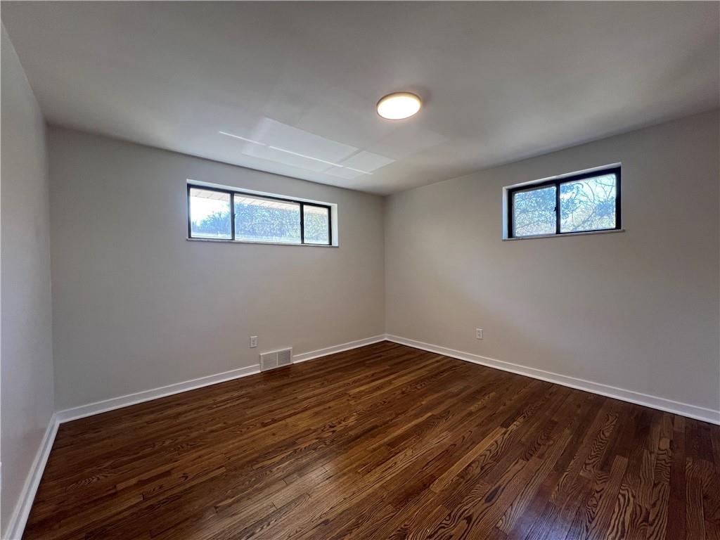 658 Fort Couch Road Pittsburgh, PA 15241 - Photo 11 of 17 a view of a room with wooden floor and window
