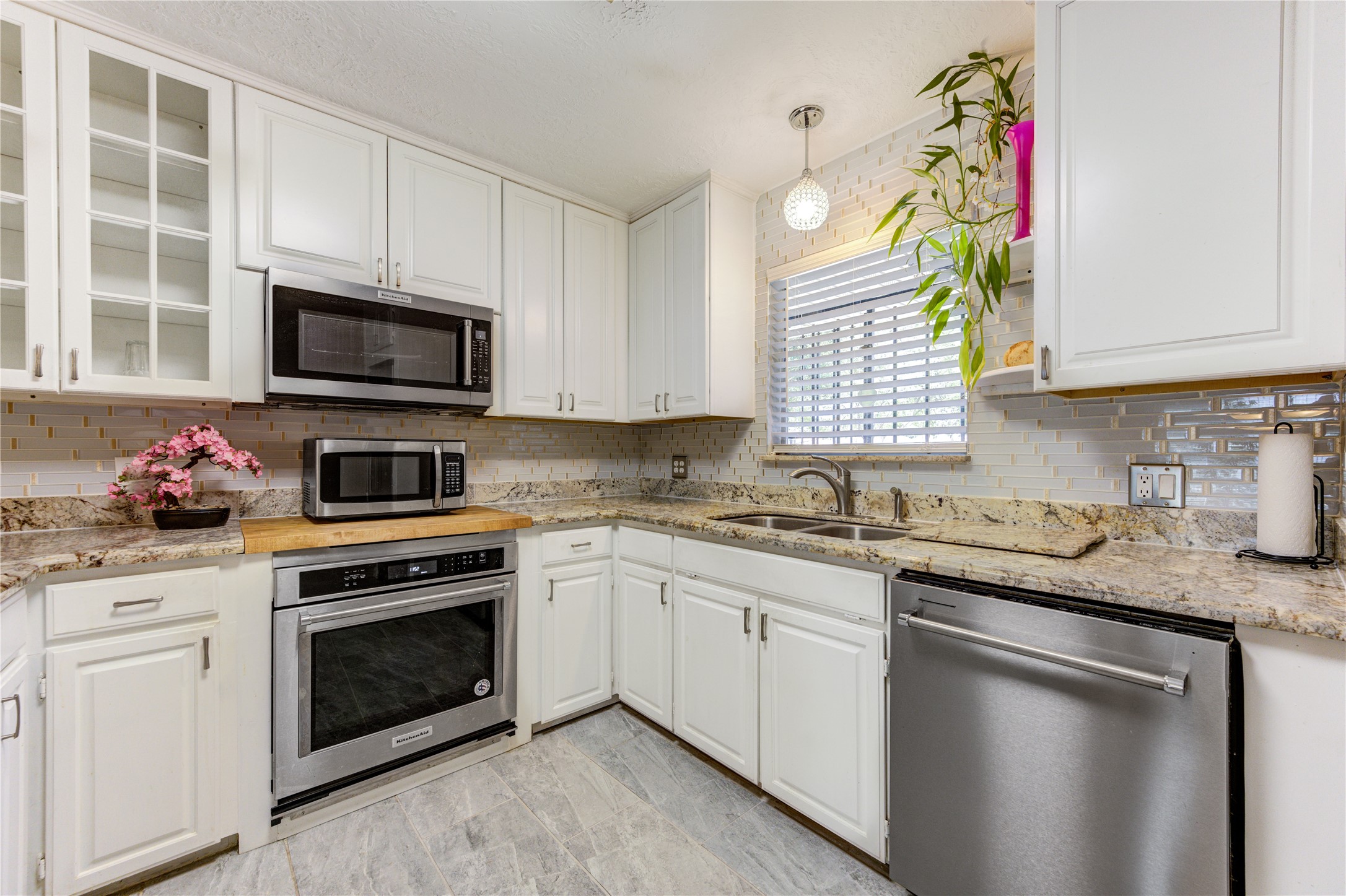 4018 Blalock Road Houston, TX 77080 - Photo 15 of 35 Chef's kitchen goals! Fully equipped with premium stainless steel Kitchen Aid appliances.