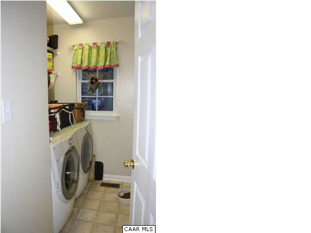 308 Pine Ridge Road Faber, VA 22938 - Photo 22 of 27 a utility room with dryer and washer