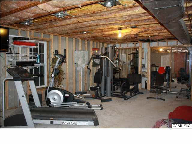 308 Pine Ridge Road Faber, VA 22938 - Photo 23 of 27 a room with lots of gym equipment