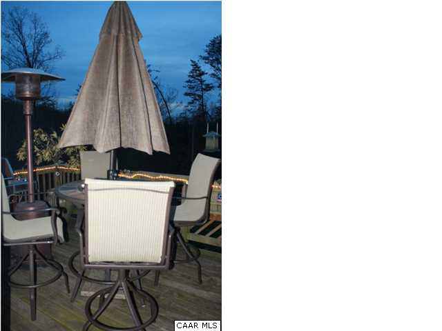 308 Pine Ridge Road Faber, VA 22938 - Photo 27 of 27 a room with a table and chairs