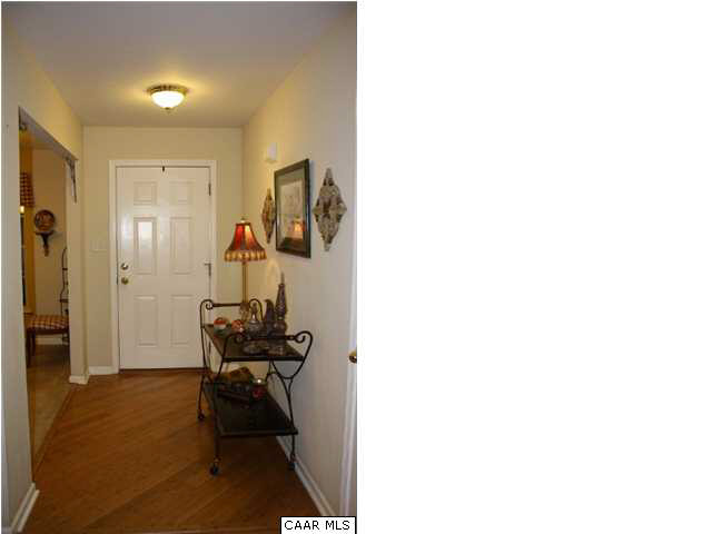 308 Pine Ridge Road Faber, VA 22938 - Photo 3 of 27 a view of a hallway with couch and a dining room view
