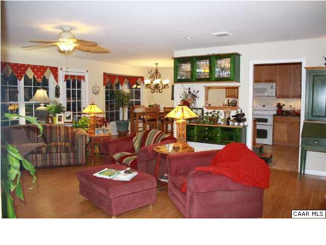 308 Pine Ridge Road Faber, VA 22938 - Photo 4 of 27 a living room with furniture and a flat screen tv