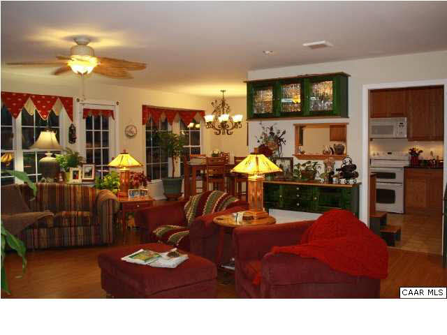 308 Pine Ridge Road Faber, VA 22938 - Photo 5 of 27 a living room with lots of furniture and kitchen view