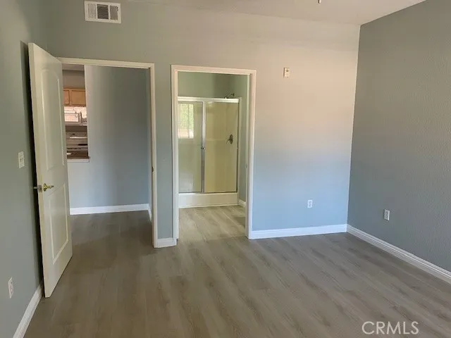 wooden floor and windows in a room