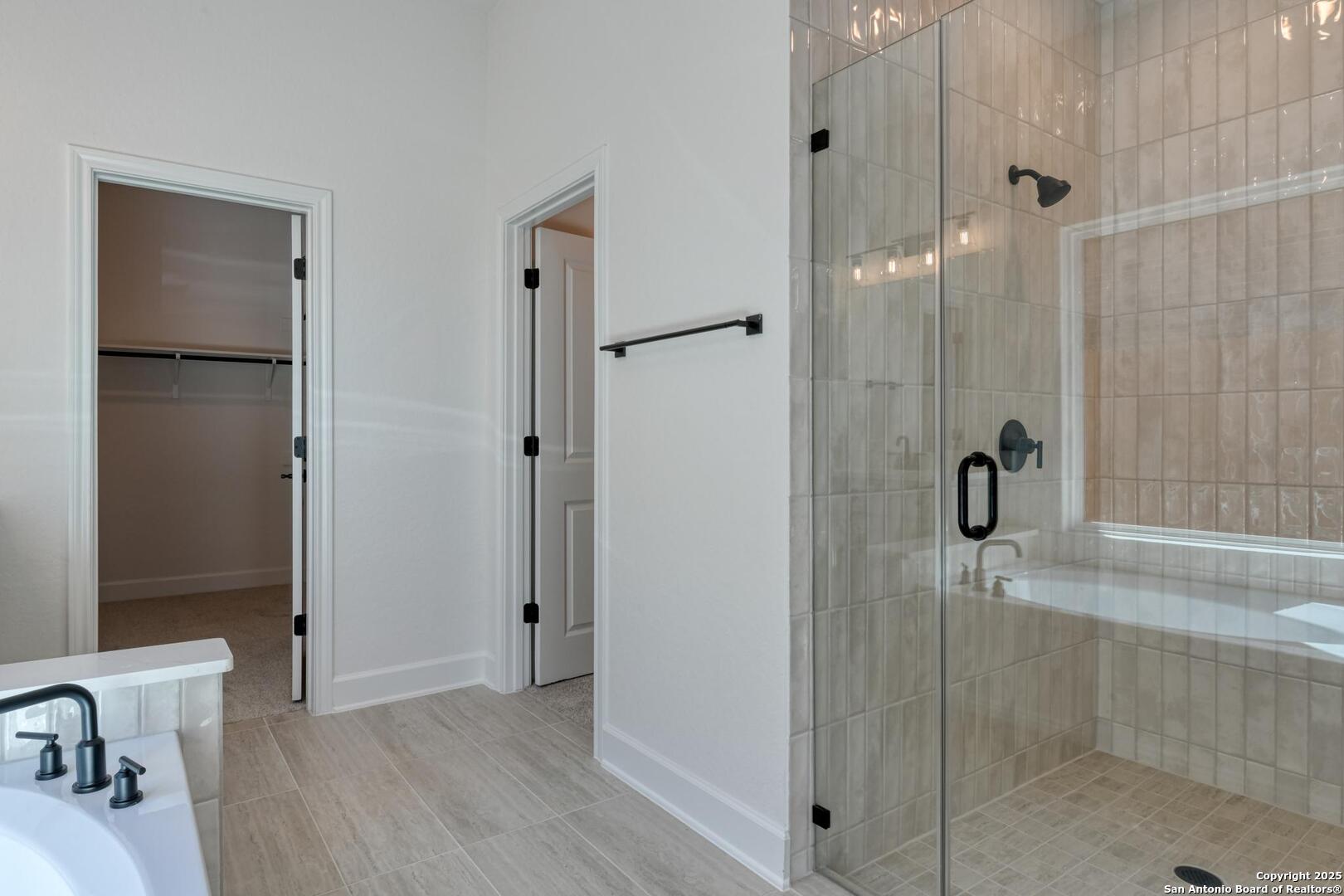 178 Annette Drive Castroville, TX 78009 - Photo 24 of 43 a bathroom with a shower