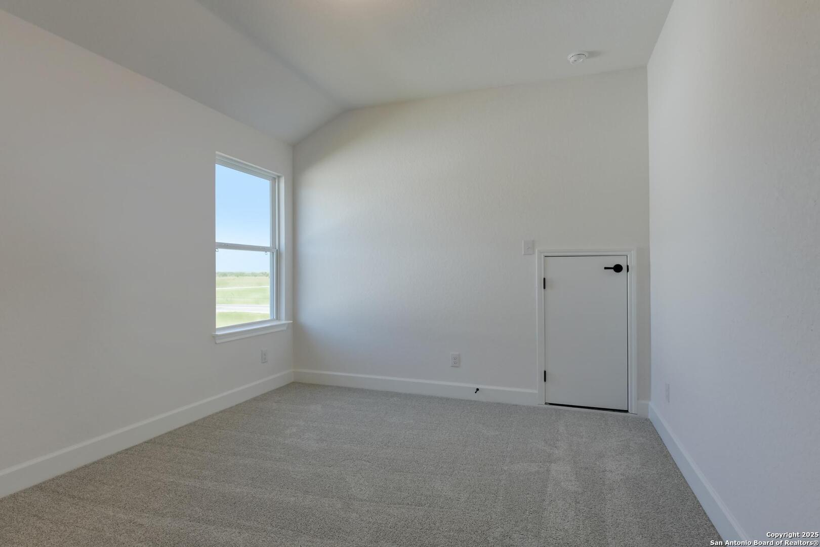 178 Annette Drive Castroville, TX 78009 - Photo 37 of 43 an empty room with a window