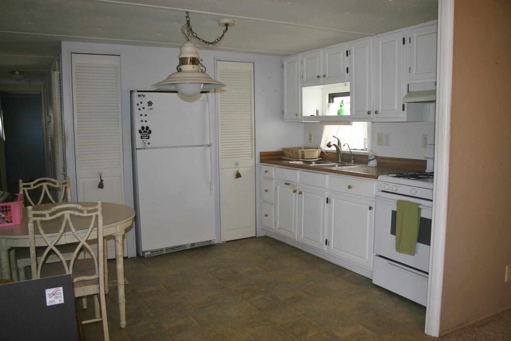 6940 Southeast Ridgeway Terrace Hobe Sound, FL 33455 - Photo 3 of 22 002