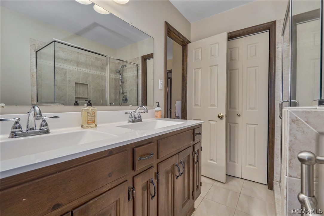9630 Pasture Hill Road Midlothian, VA 23112 - Photo 16 of 27 Primary bath with dual sink and walk in tiled shower