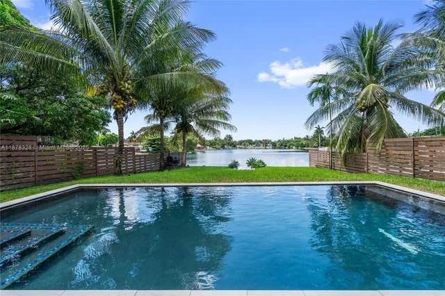 a view of an outdoor space and swimming pool