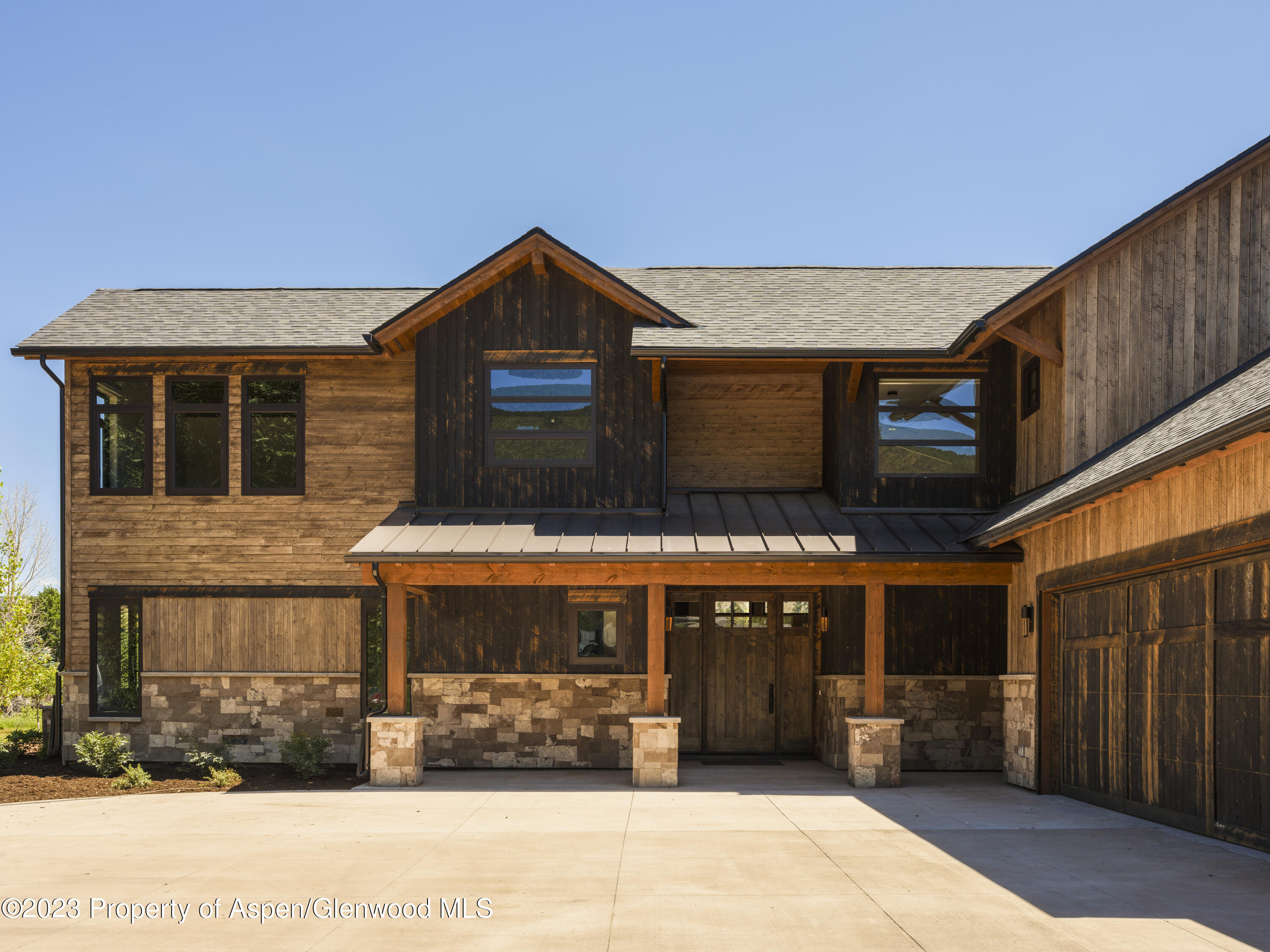 151 Sundance Trail Carbondale, CO 81623 - Photo 15 of 22 a front view of a house with a garage
