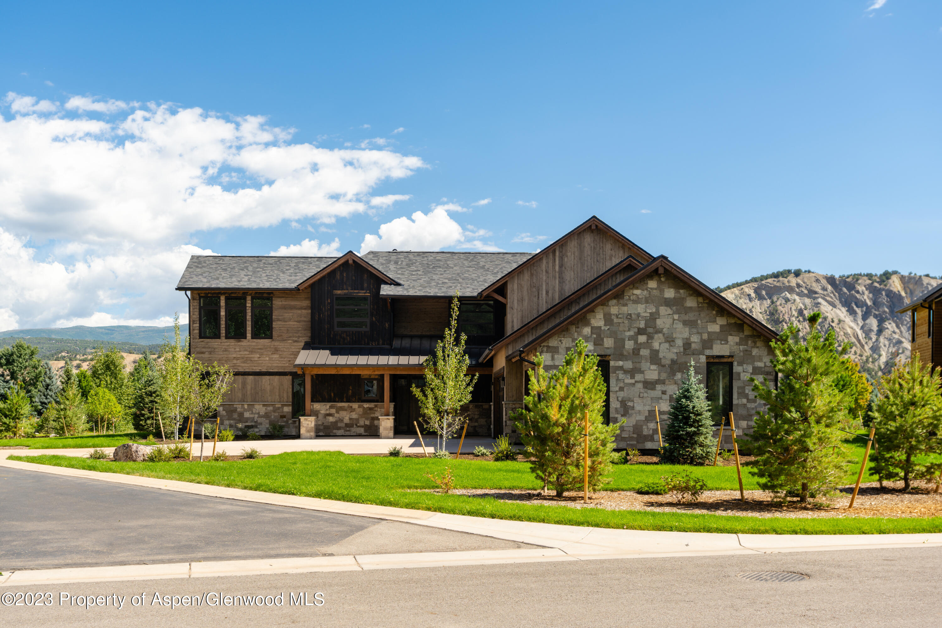 151 Sundance Trail Carbondale, CO 81623 - Photo 19 of 22 a view of a house next to a yard