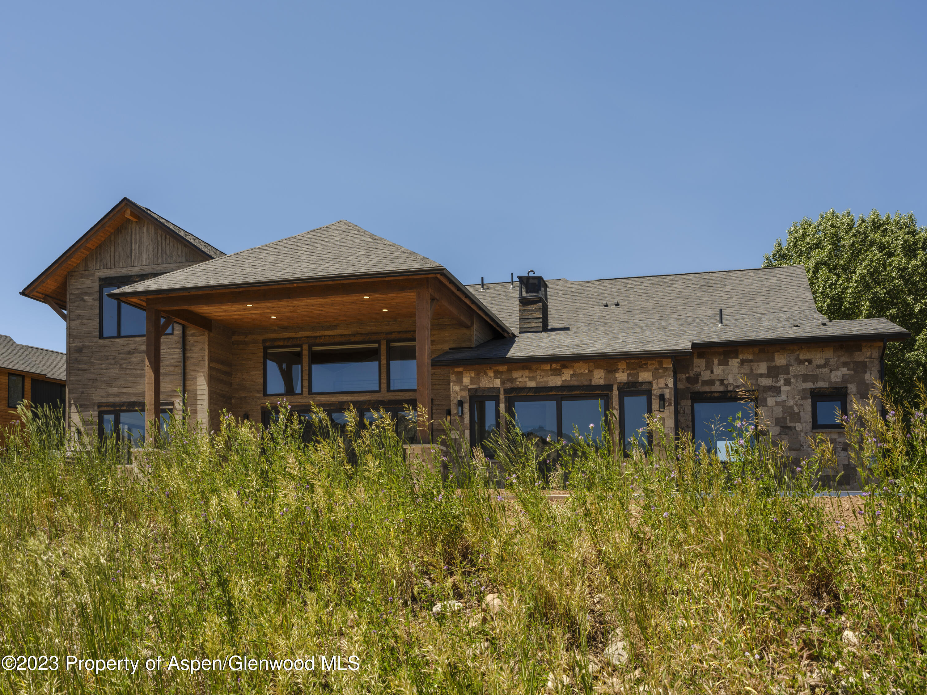 151 Sundance Trail Carbondale, CO 81623 - Photo 20 of 22 a front view of a house with a yard