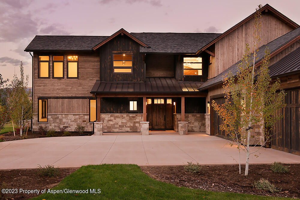 151 Sundance Trail Carbondale, CO 81623 - Photo 2 of 22 a front view of a house with a yard