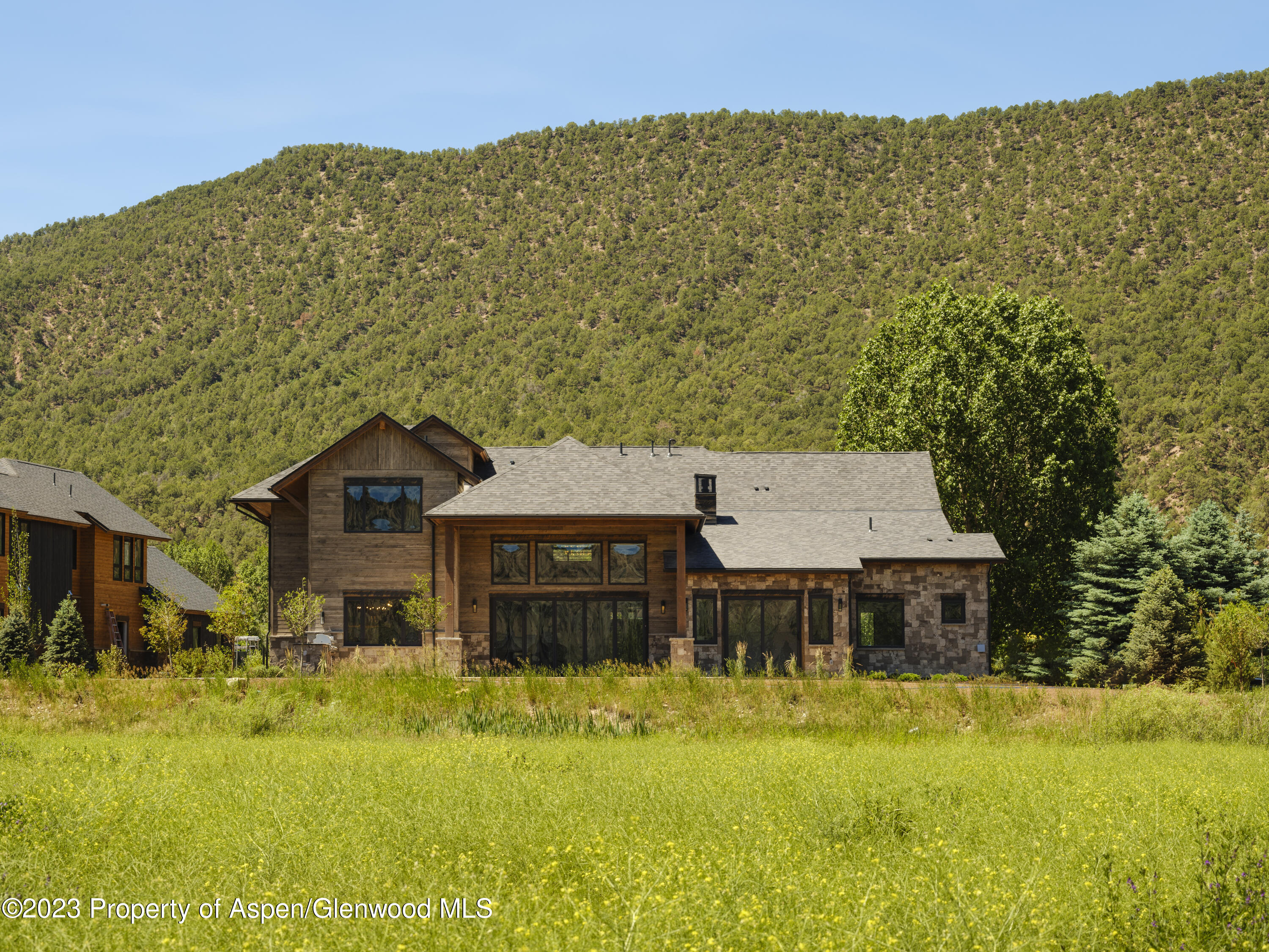151 Sundance Trail Carbondale, CO 81623 - Photo 21 of 22 a aerial view of a house with swimming pool and big yard