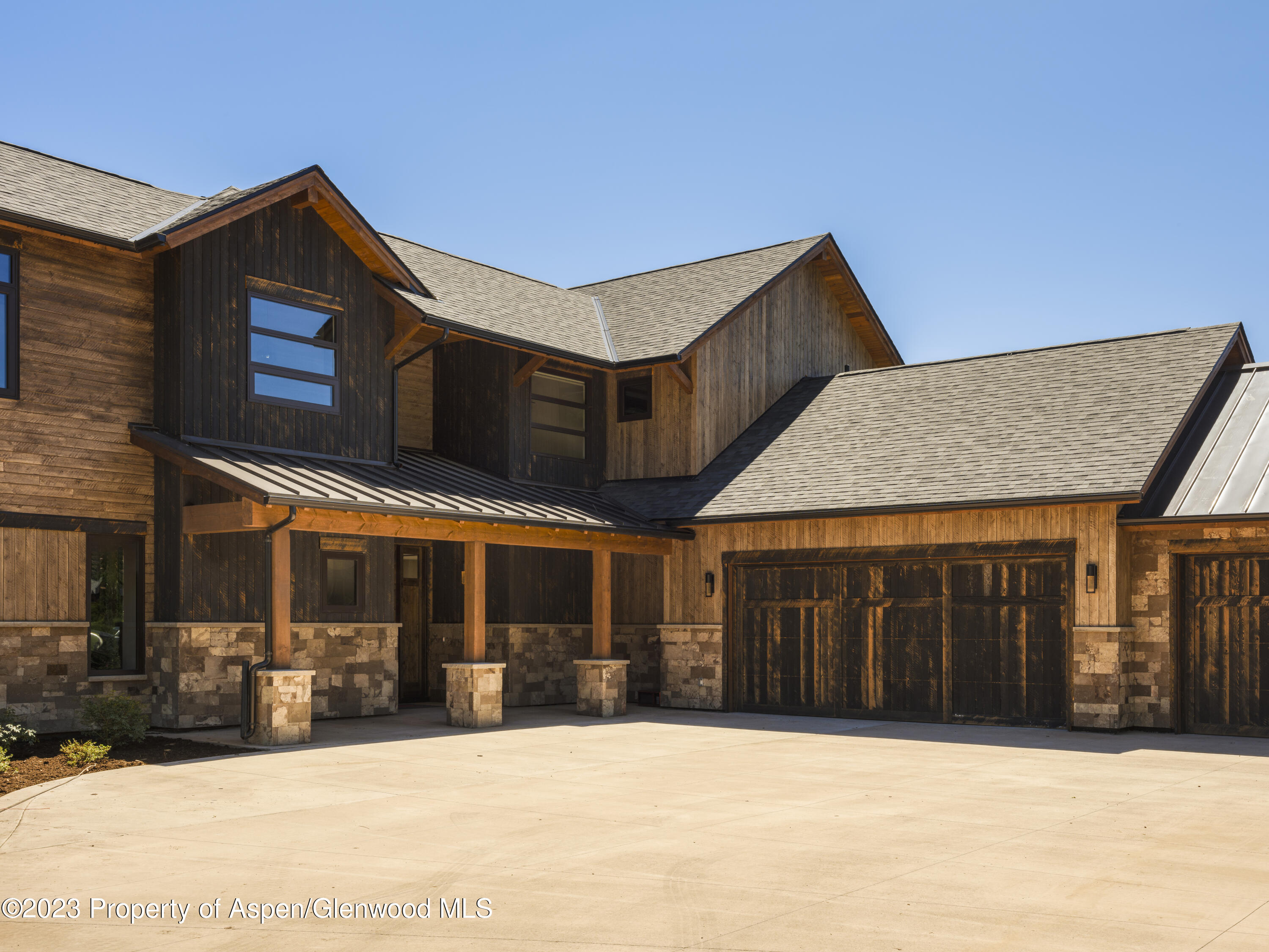 151 Sundance Trail Carbondale, CO 81623 - Photo 3 of 22 a front view of a house with a yard