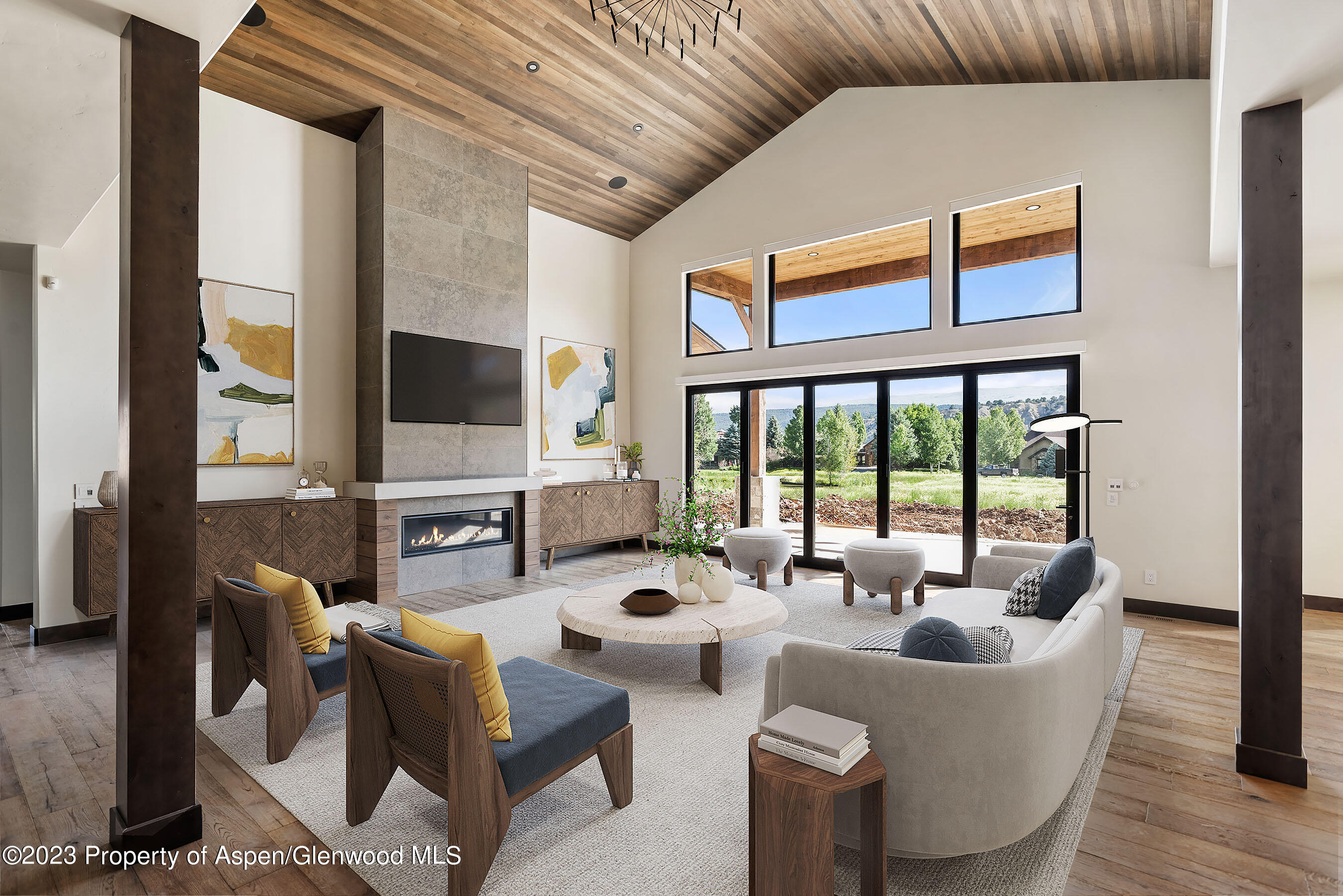 151 Sundance Trail Carbondale, CO 81623 - Photo 4 of 22 a living room with fireplace furniture and a large window