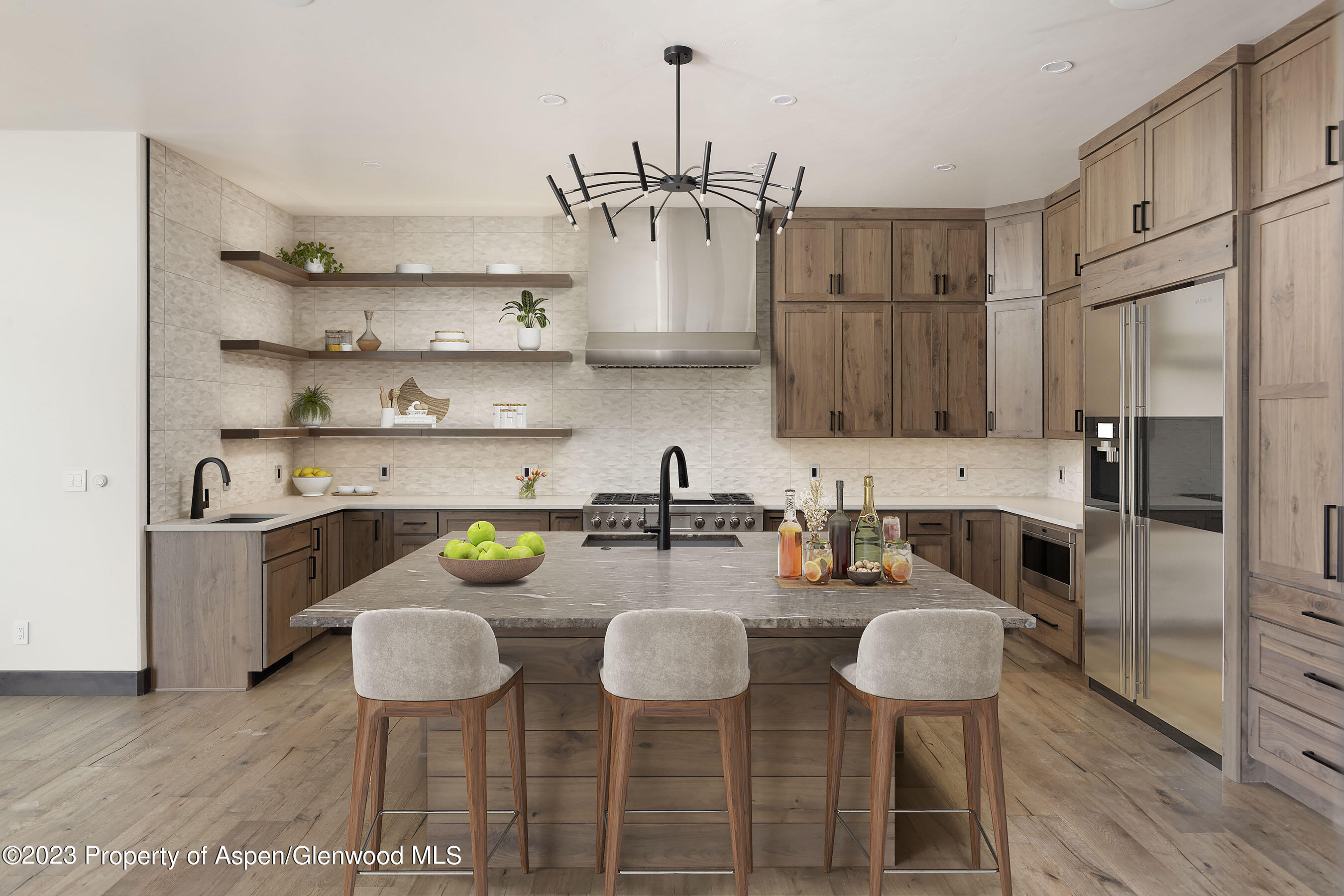 151 Sundance Trail Carbondale, CO 81623 - Photo 6 of 22 a kitchen with stainless steel appliances granite countertop a sink and a refrigerator