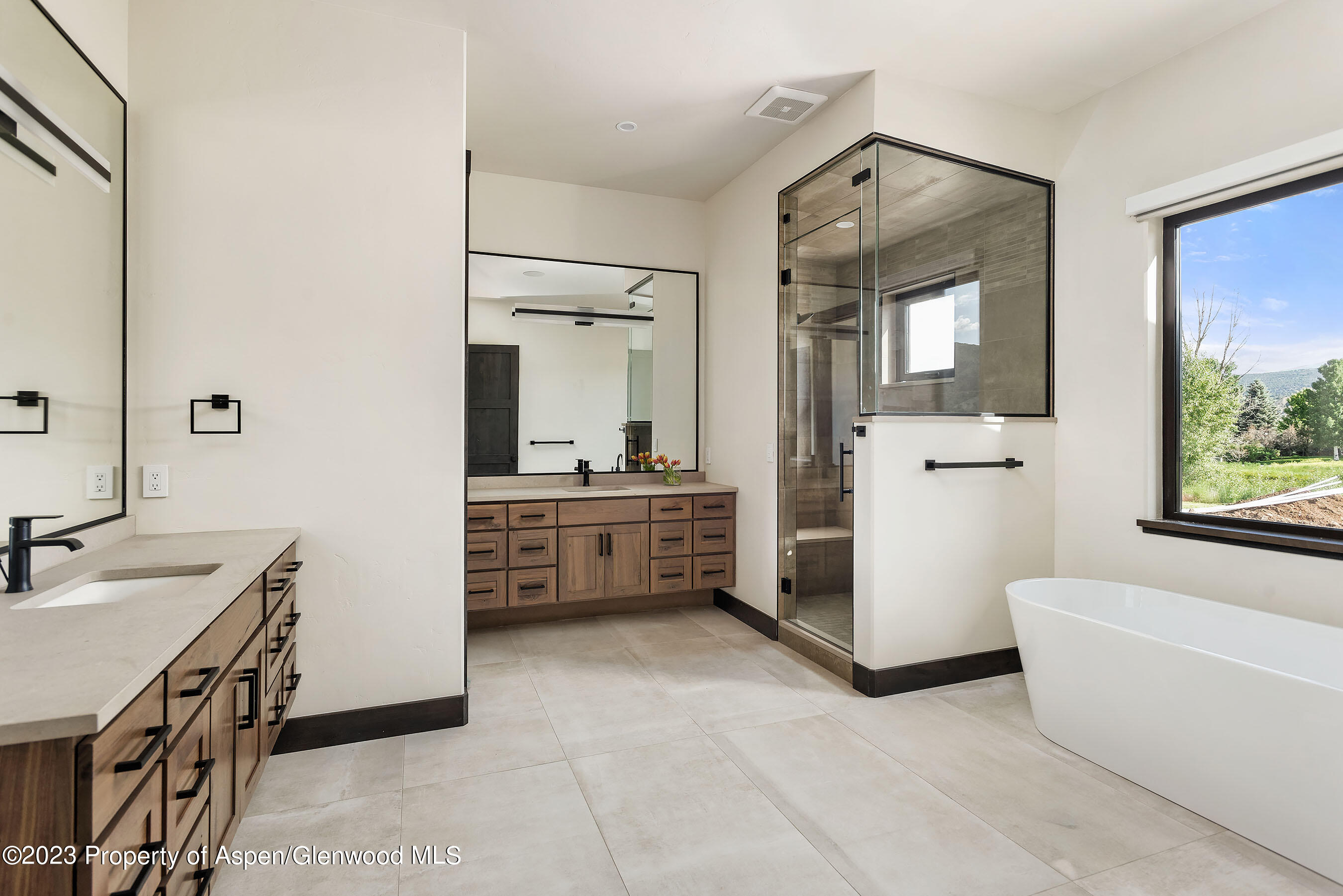 151 Sundance Trail Carbondale, CO 81623 - Photo 8 of 22 a bathroom with a tub sink and mirror