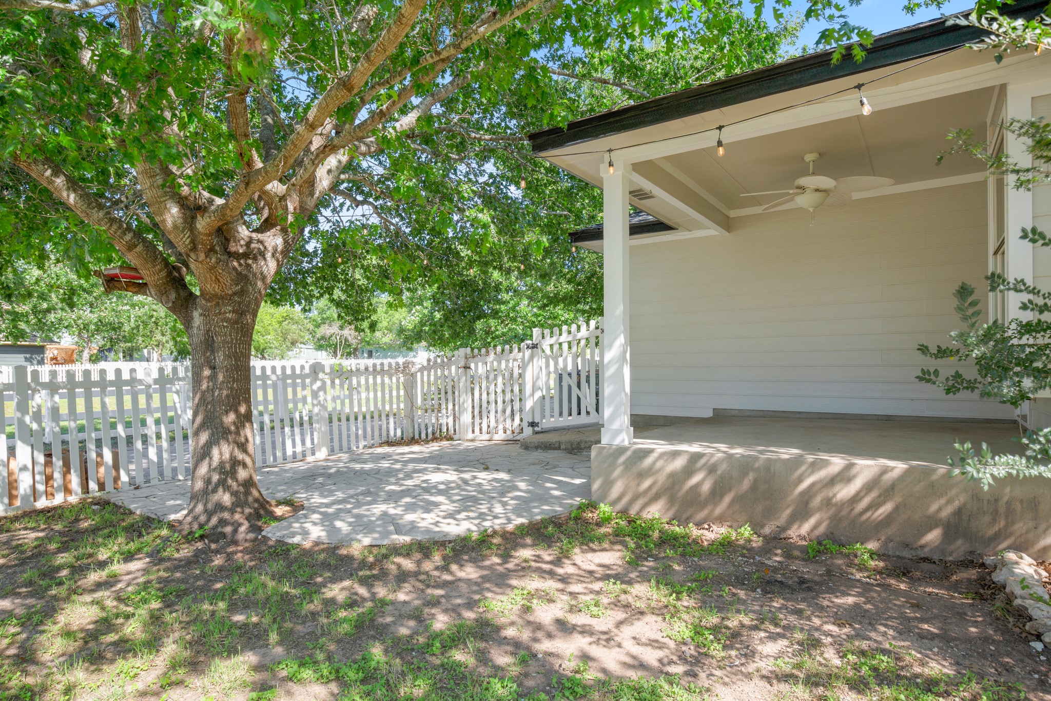 151 Sampson Kyle, TX 78640 - Photo 22 of 23 The outdoor spaces feel intimate and manageable, offering room to garden, entertain, or simply enjoy the slower pace that makes Plum Creek so appealing.