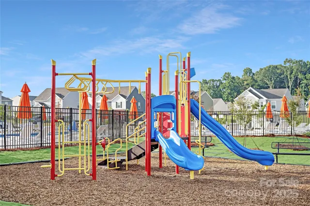 a view of park with swings