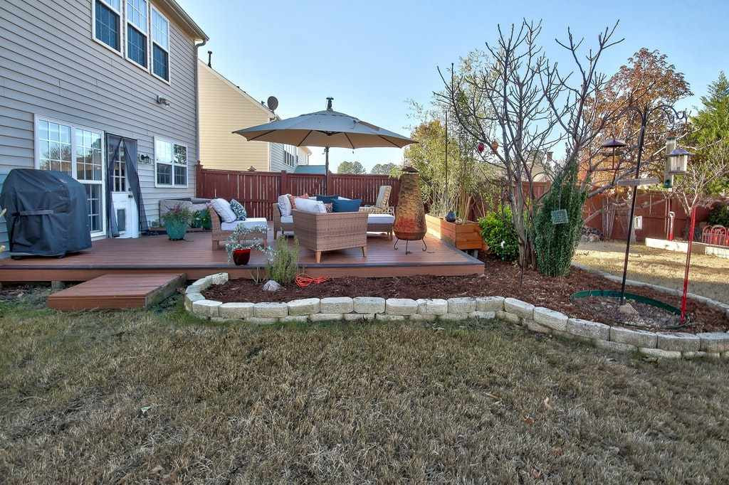 5448 Wind Mountain Lane Raleigh, NC 27613 - Photo 22 of 25 Backyard
