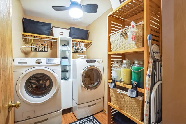 a view of a hallway with washer and dryer