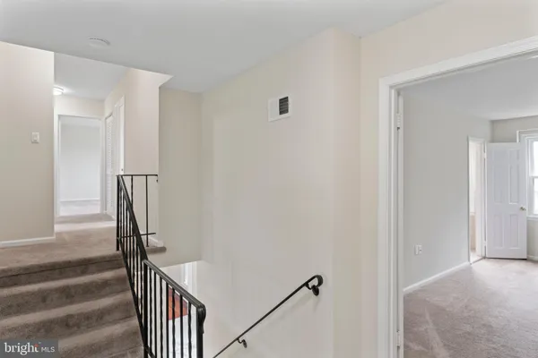 a view of a room that has a window in it