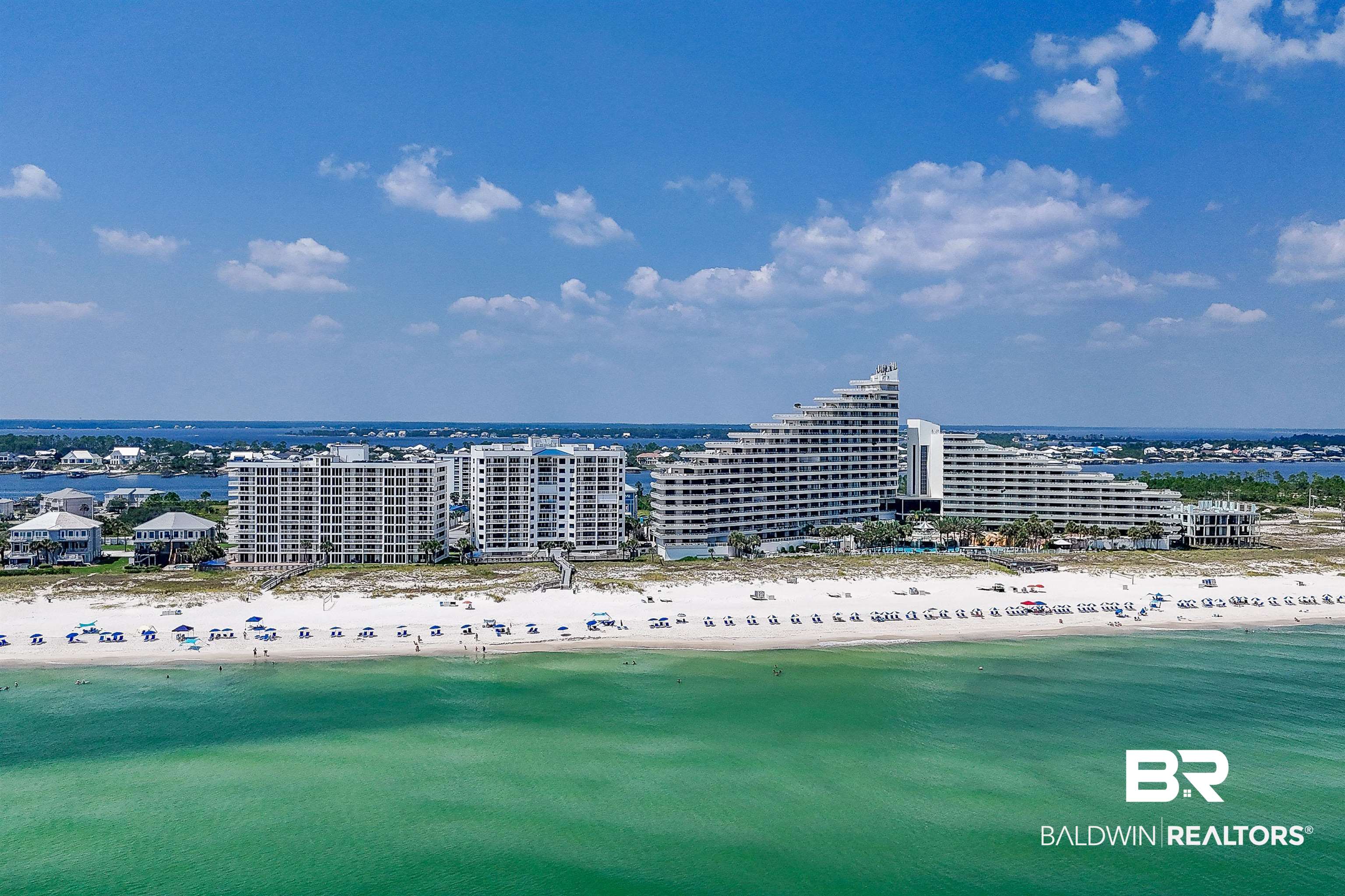 16287 Perdido Key Drive, Unit 105 Pensacola, FL 32507 - Photo 65 of 66 Beachfront property featuring a white sand beach and emerald green water