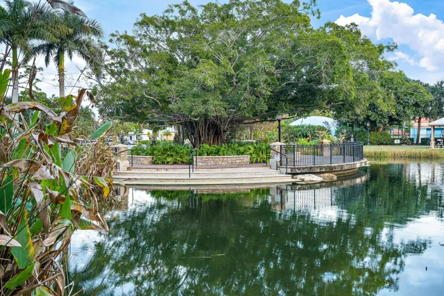 a view of swimming pool with a patio and a yard