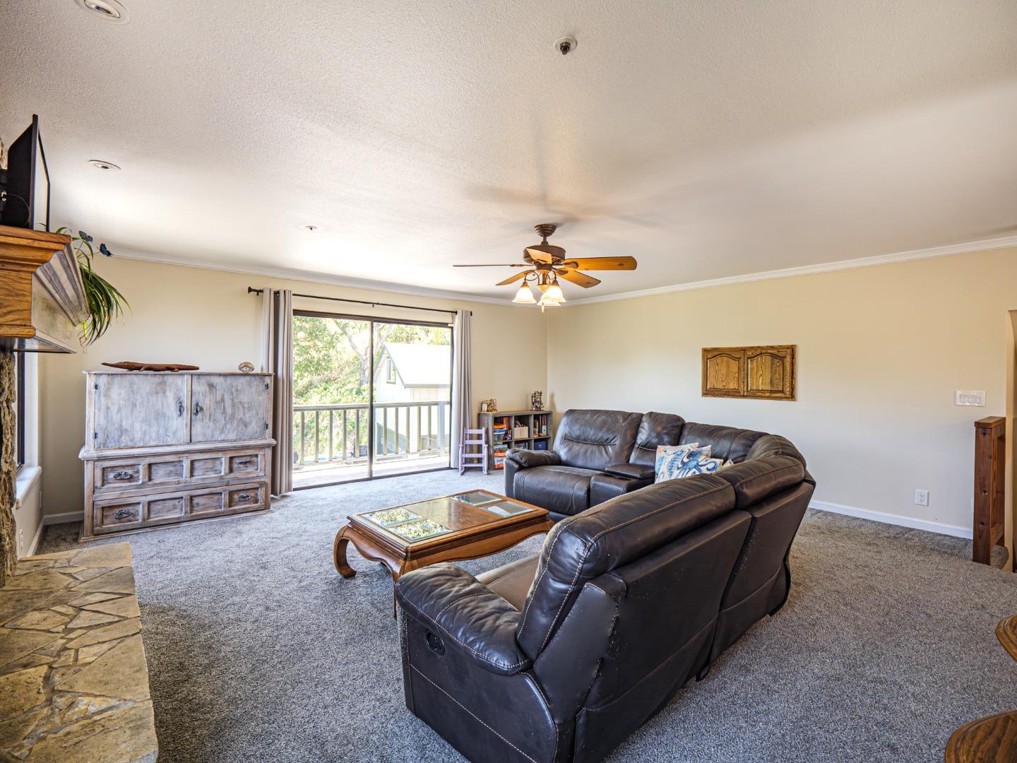 577 Carr Avenue Aromas, CA 95004 - Photo 11 of 37 a living room with furniture and a flat screen tv