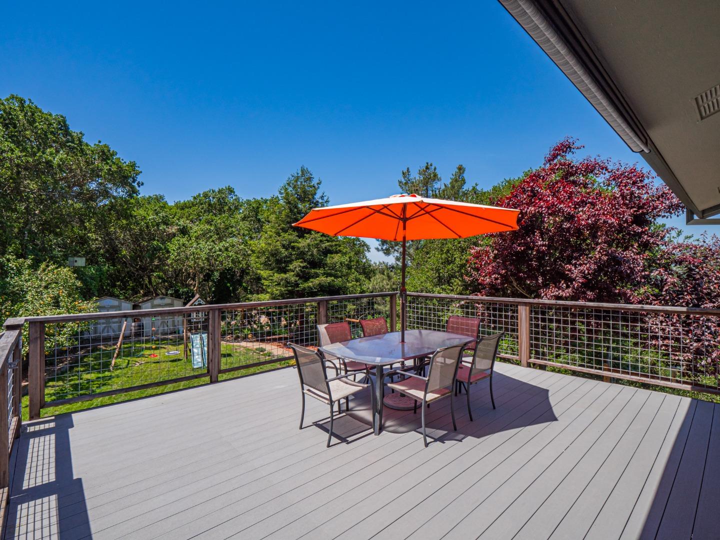 577 Carr Avenue Aromas, CA 95004 - Photo 15 of 37 a view of a chairs and table on the wooden deck