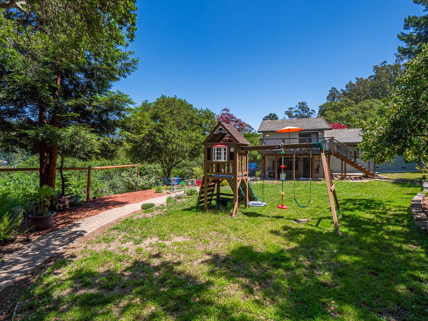 577 Carr Avenue Aromas, CA 95004 - Photo 18 of 37 a view of a house with backyard and sitting area