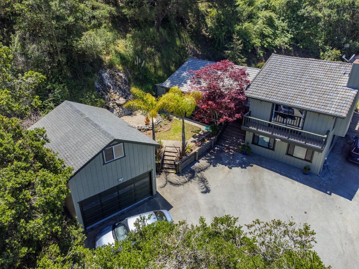 577 Carr Avenue Aromas, CA 95004 - Photo 2 of 37 an aerial view of a house with wooden floor and a yard