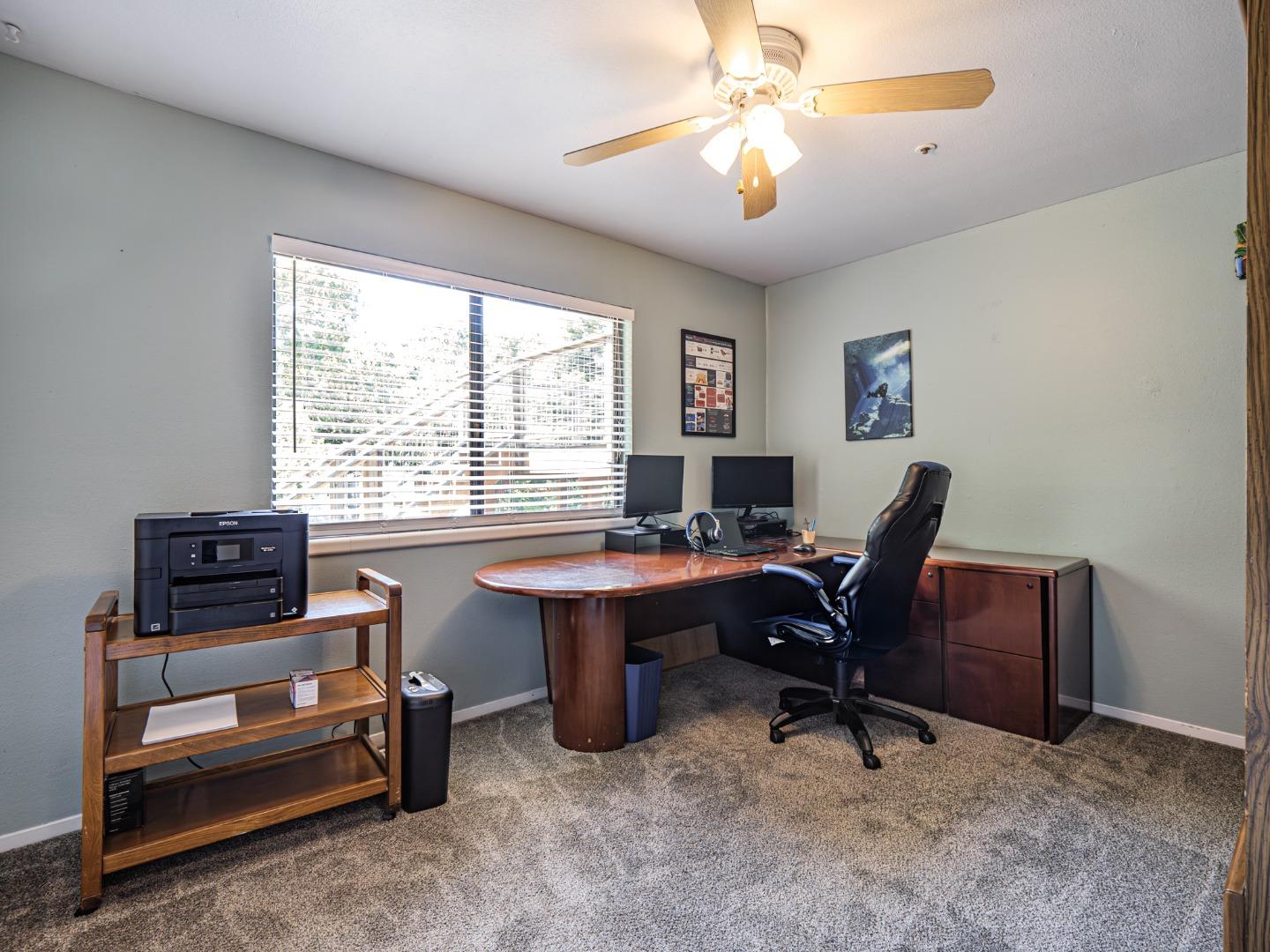 577 Carr Avenue Aromas, CA 95004 - Photo 32 of 37 a view of a workspace with a window and a work space