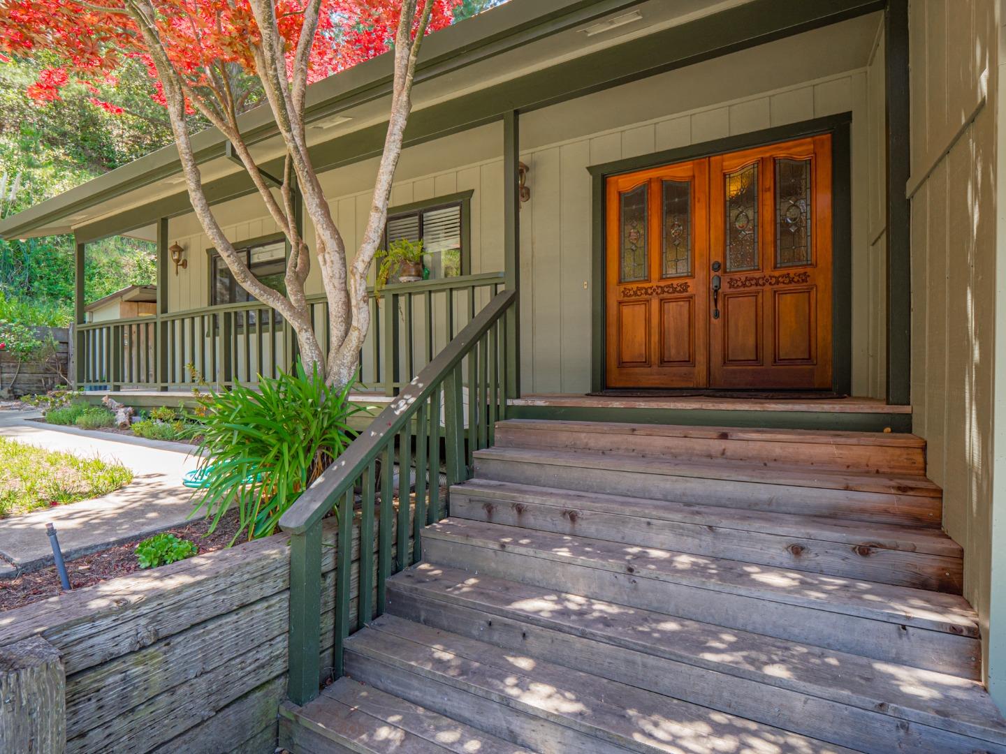 577 Carr Avenue Aromas, CA 95004 - Photo 4 of 37 a view of backyard with small cabin and wooden floor