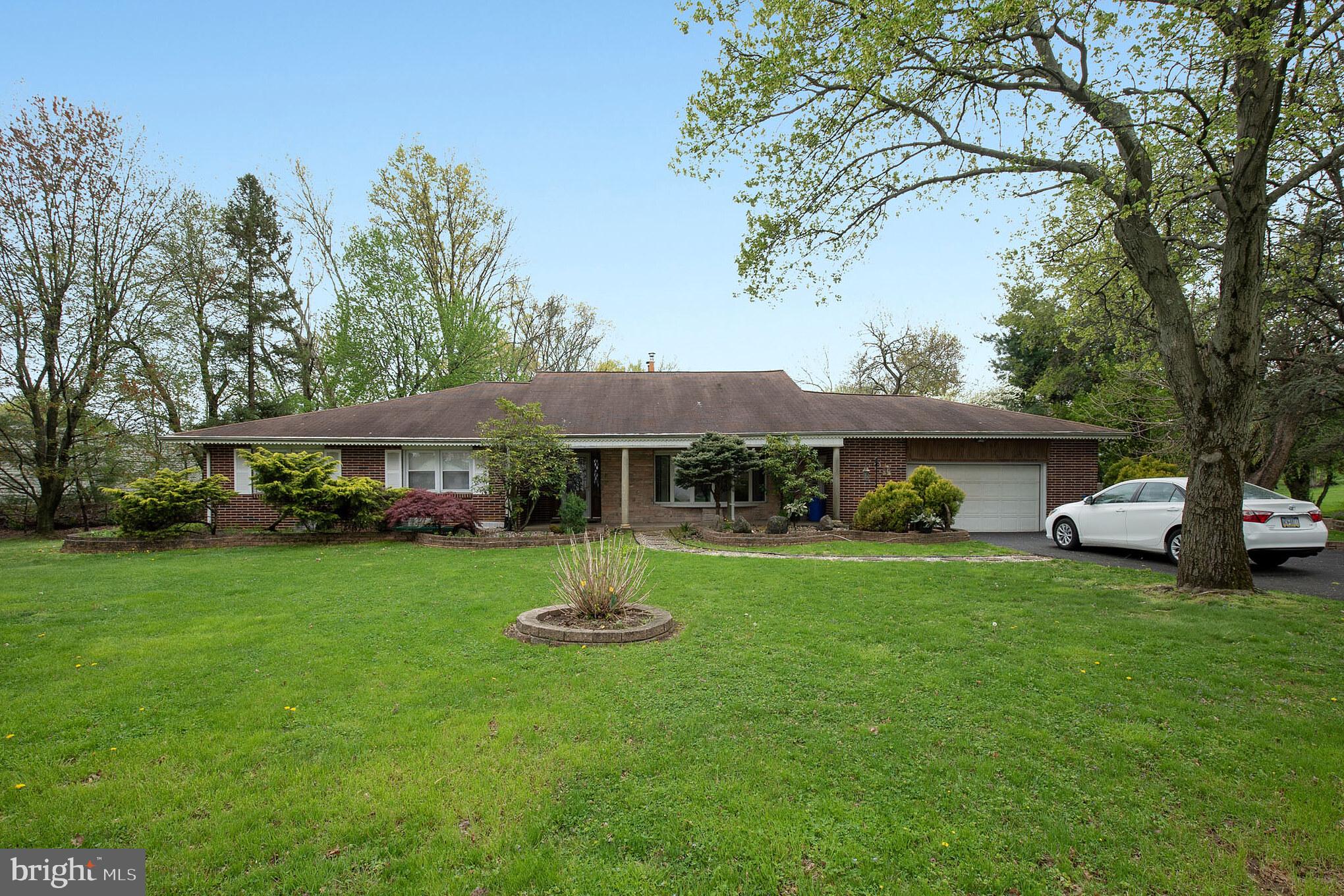 Front Yard with large driveway