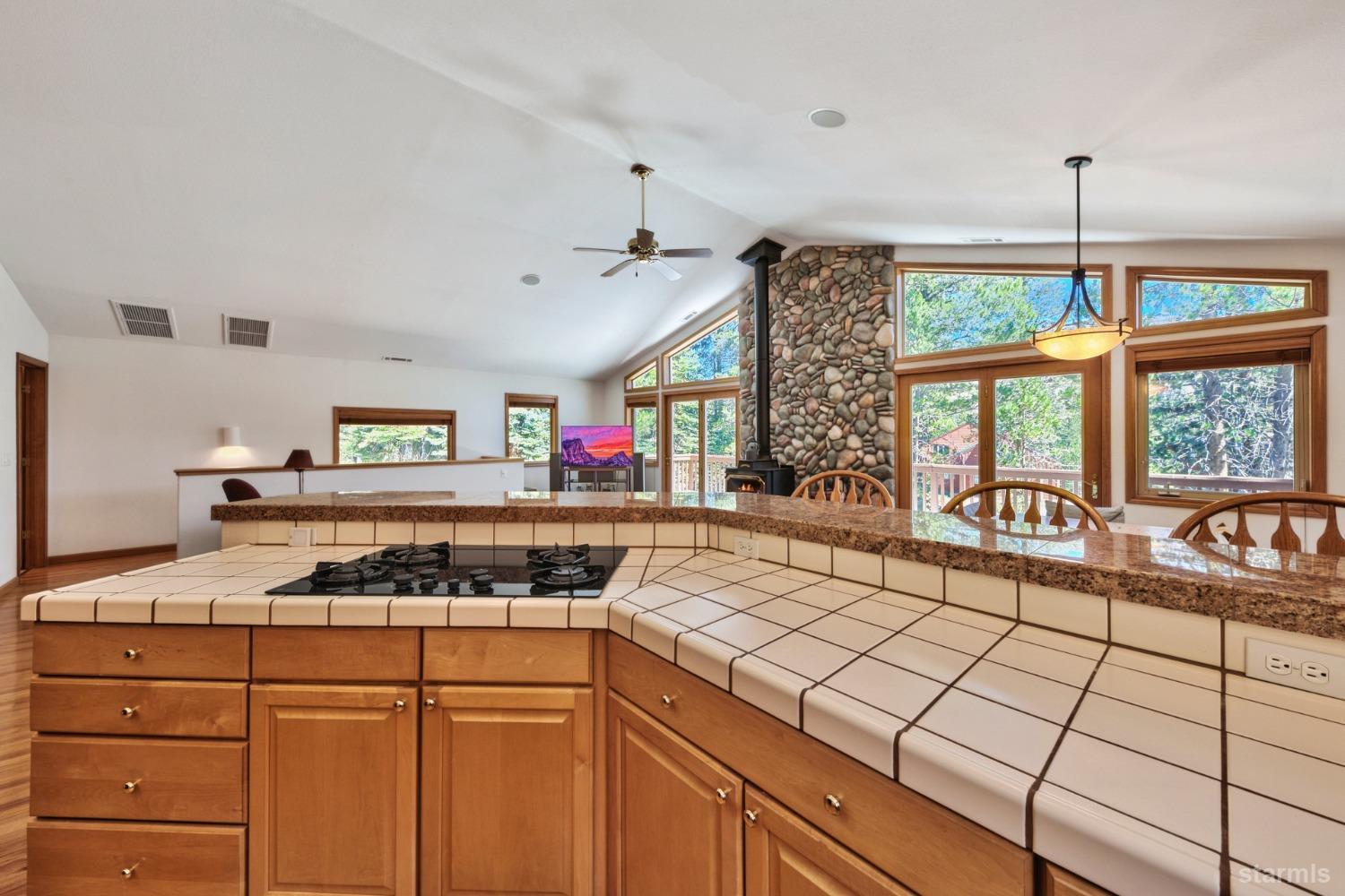 34235 Fremont Road Kirkwood, CA 95646 - Photo 13 of 29 a kitchen with a stove a sink and a cabinets